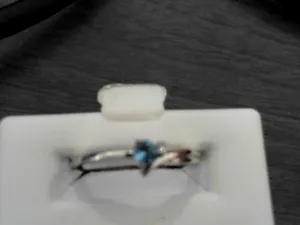 10K BLUE TOPAZ AND DIA TWIST B