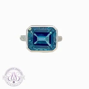 18kt White Gold London Blue Topaz 7.4ct and Diamond ring horizontal set