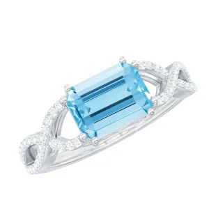 Emerald Cut Aquamarine East West Crossover Ring with Diamond