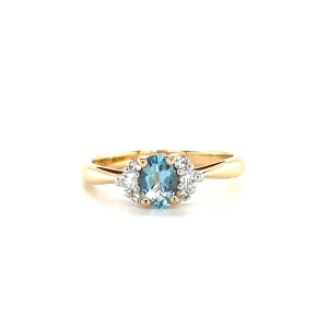 Oval Aquamarine Ring with Six Side Diamonds in 14K Yellow Gold