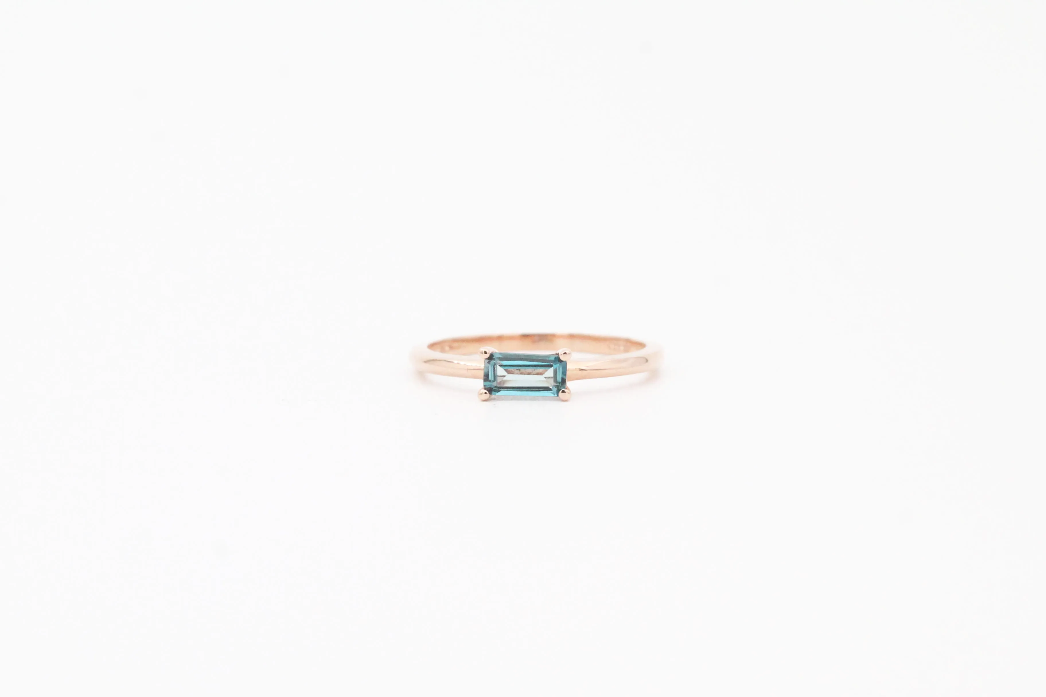 Rose Gold Emerald Cut London Blue Topaz Ring